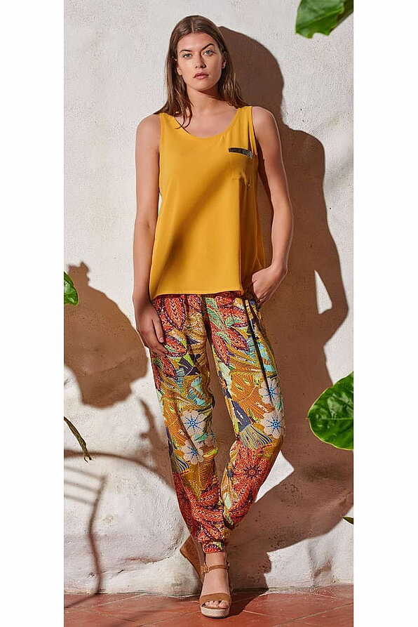 WOMAN PANTS WITH CUFF-BAND AND LEAVES DESIGN