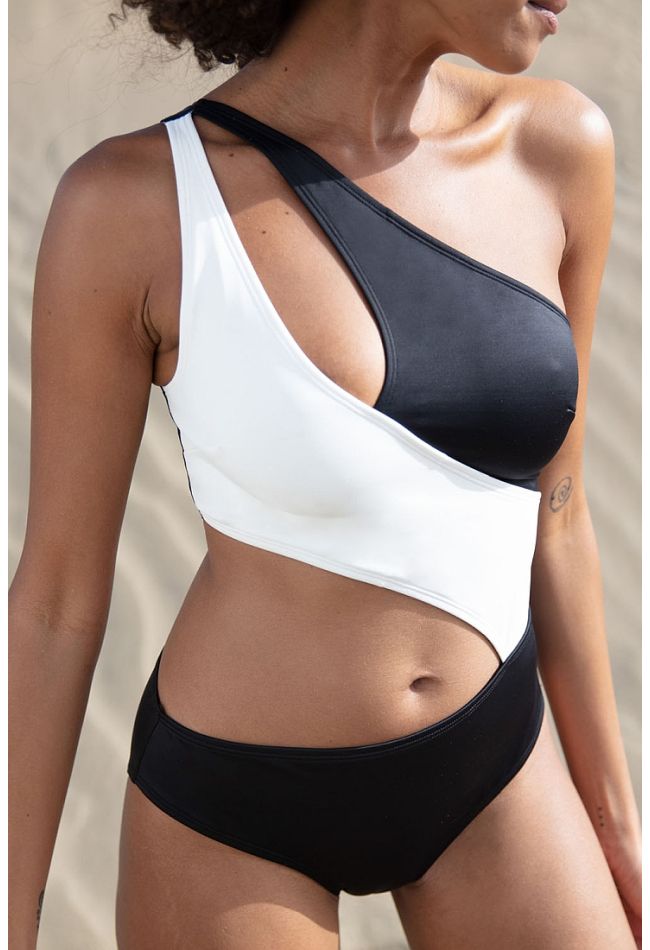 KOMAVE SWIMSUIT WOMAN ONE-PIECE ONE SHOULDER IN BLACK AND WHITE WITH REMOVABLE PADS WIRELESS AND DARING CUTS OUT